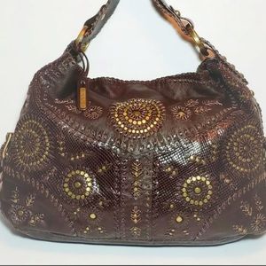Isabella Fiore handstitched Leather Python purse barely used.